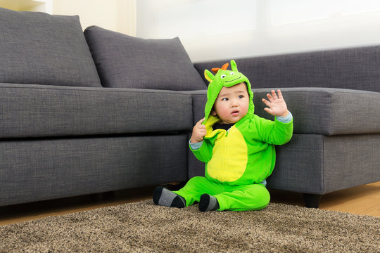 Baby with dinosaur halloween party costume