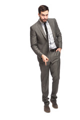 serious elegant man pointing down