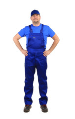 Worker in blue overalls.