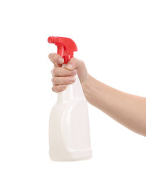 Hand holding white plastic spray bottle.