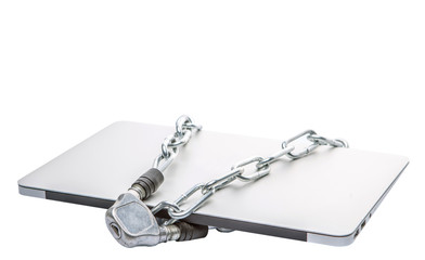Laptop and chains over white background for PC security