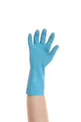 Hand in blue glove.