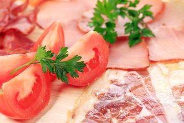 Close up of tomato and meat.