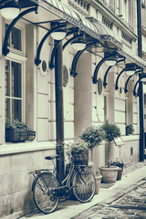 Vintage stylized photo of Old bicycle outdoors