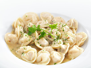 Traditional Russian dumplings with meet or cheese served with pa