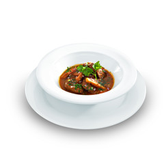 Rich hot hungarian beef goulash with traditional topping served