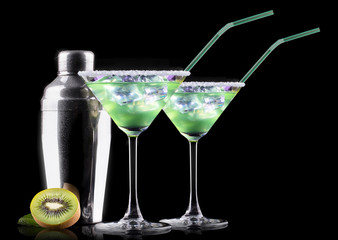 Cocktail Smoothie, with slices of kiwi on a black