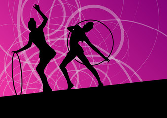 Obraz na płótnie Canvas Active young girls calisthenics sport gymnasts silhouettes in sp
