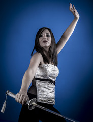 Warrior posing.Anime stylized brunette with short hair holding a