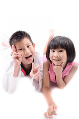 Asian children are lying down on white background
