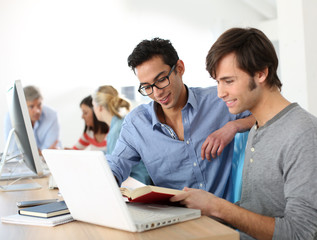 College students working together on project