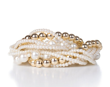 jewelry made ​​of gold and white pearls
