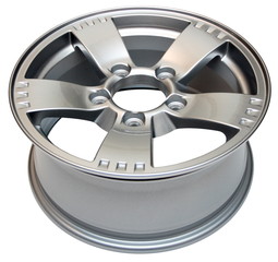 Obraz premium An isolated modern aluminum alloy wheel on a white background