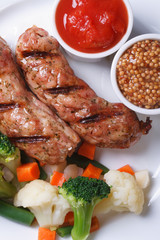 grilled sausage with vegetables, ketchup and Dijon mustard.