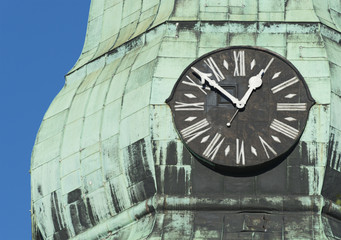 Dial clock at a church in old city of Riga, Latvia