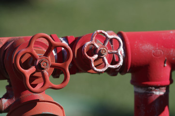 red metallic fire hydrant