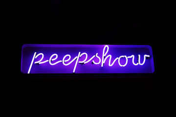 Neon peepshow sign from the red light district - 61605273
