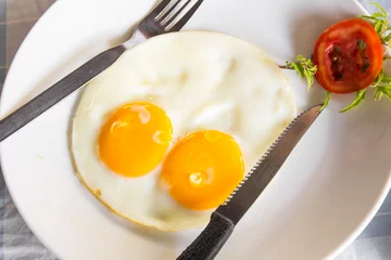 Keuken foto achterwand Spiegeleieren Close-up gebakken ei ontbijt