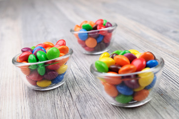 Glass bowls with colorful candies