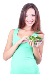 Beautiful girl with fresh salad isolated on white