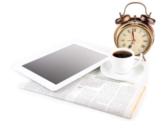 Tablet, newspaper, cup of coffee and alarm clock, isolated