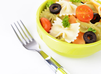 Delicious pasta with tomatoes on plate isolated on white