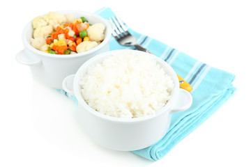 Cooked rice and vegetables isolated on white