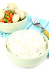 Cooked rice and vegetables close up