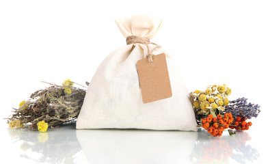 Textile sachet pouch with dried flowers, herbs  and berries,