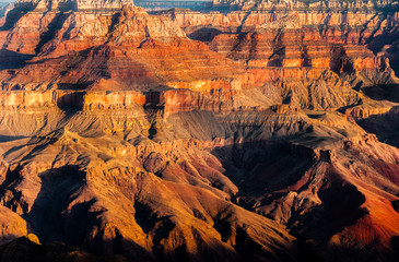 Detail of Grand Canyon rock fomation at colorful sunrise