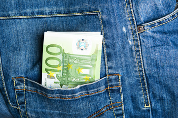 Pants jeans with euro banknotes in the pocket