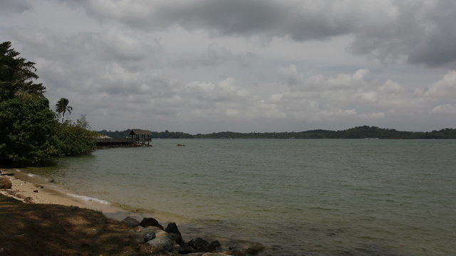 Singapore East Coast Beach with Moving Clouds Time Lapse