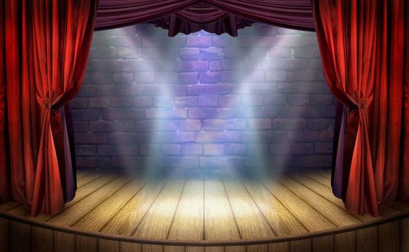 Theater stage with red curtains and spotlights
