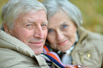 Mature couple walking in the park