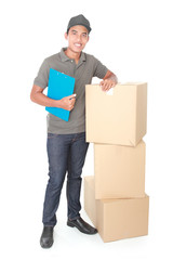 Smiling young delivery man with cardbox package