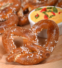 Freshly made German style pretzel with a cheddar cheese spread