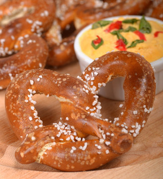 Freshly Made German Style Pretzel With A Cheddar Cheese Spread