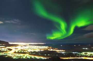 Northern lights above Reykjavik Iceland - obrazy, fototapety, plakaty