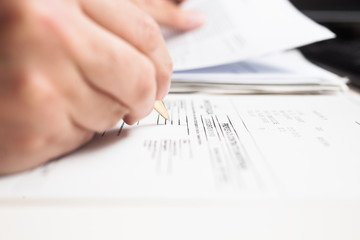 Man compiling a form