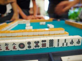 An ancient Chinese game called Mahjong as a way to spend your fr