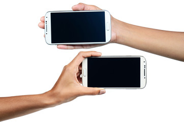 Isolated female hands holding phone