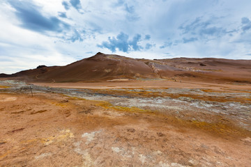 Fototapeta na wymiar Stone Desert at Geothermal Area Hverir, Iceland