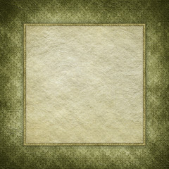 Blank handmade paper sheet on grunge background