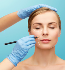 woman face and beautician hands with pencil