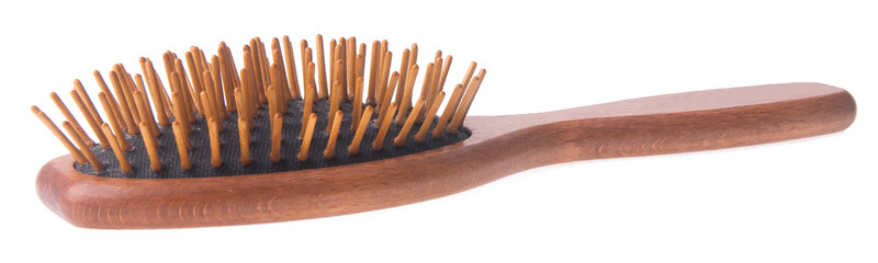 Wooden old comb on blackground