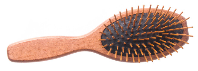 Wooden old comb on blackground