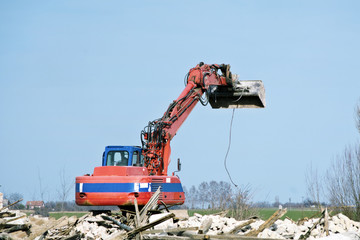 Red dredge on the demolition site