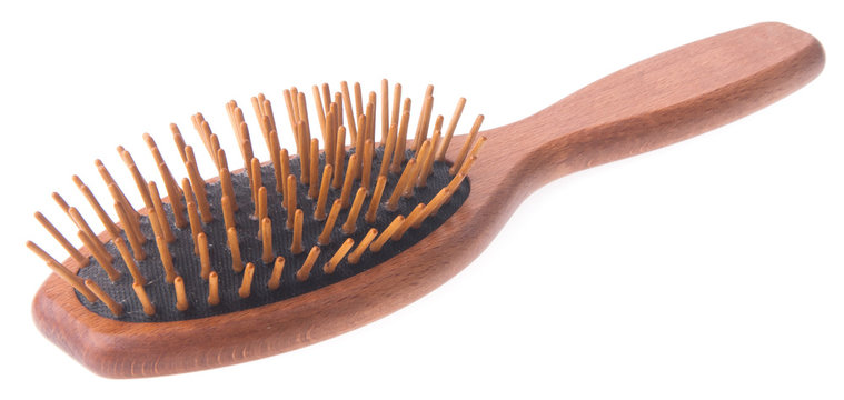 Wooden old comb on blackground