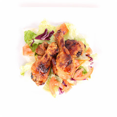 Fried chicken legs with side salad