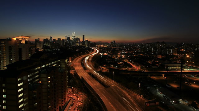 Kuala Lumpur Highway with City in Malaysia Timelapse